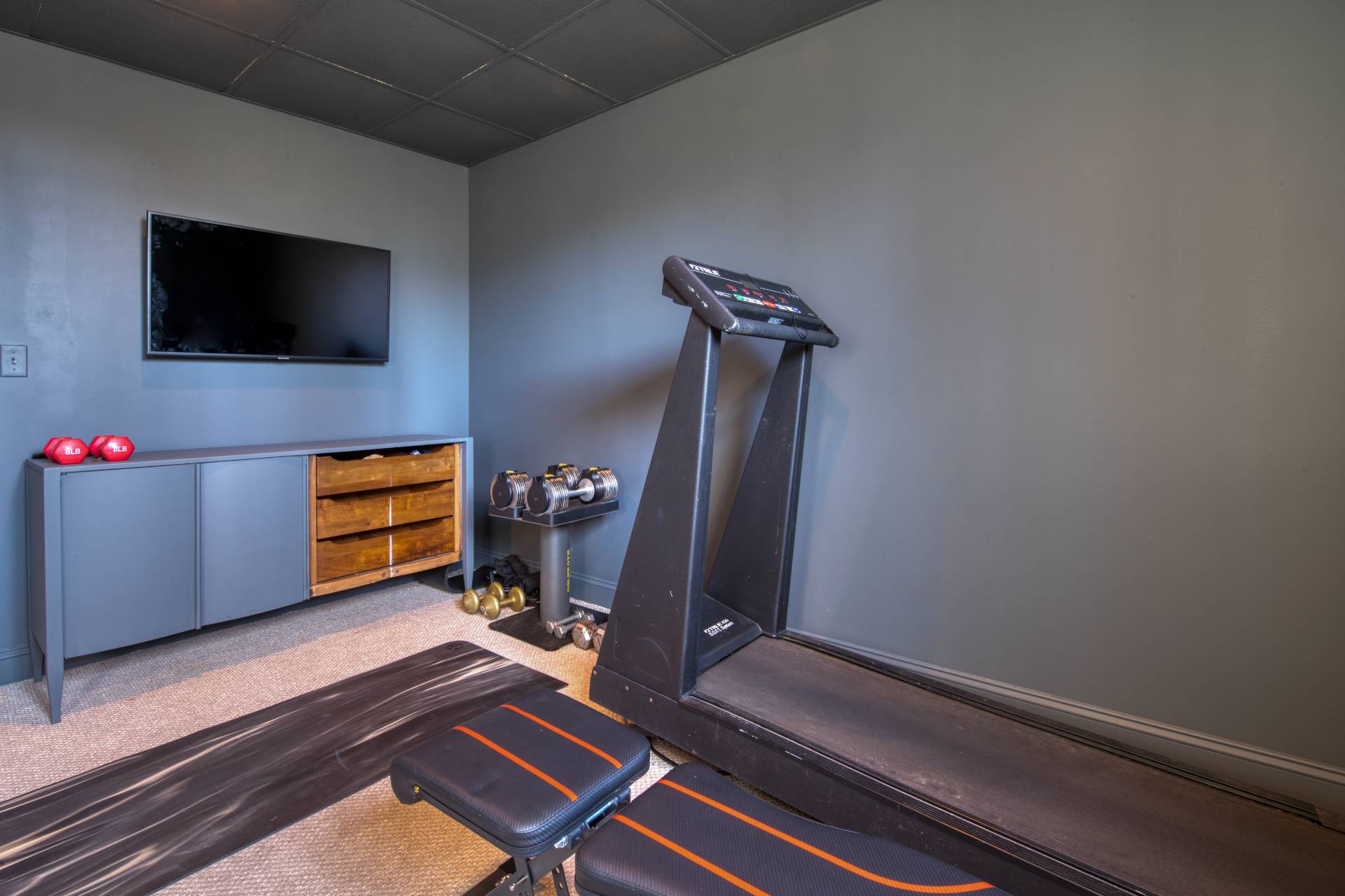 Undisclosed Address Sag Harbor, NY 11963 - Photo 21 of 23 a room with furniture and a flat screen tv