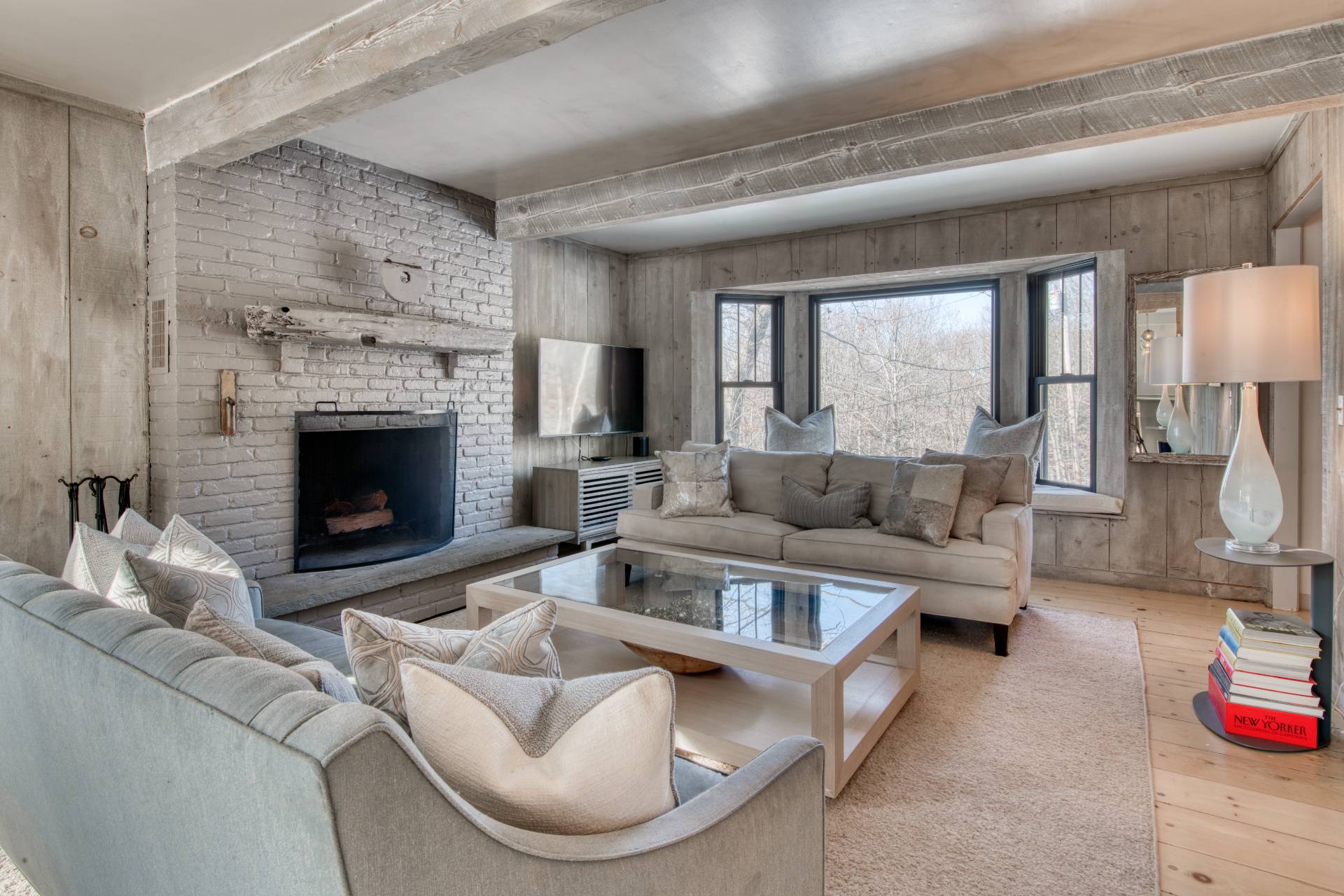 Undisclosed Address Sag Harbor, NY 11963 - Photo 6 of 23 a living room with furniture and a fireplace