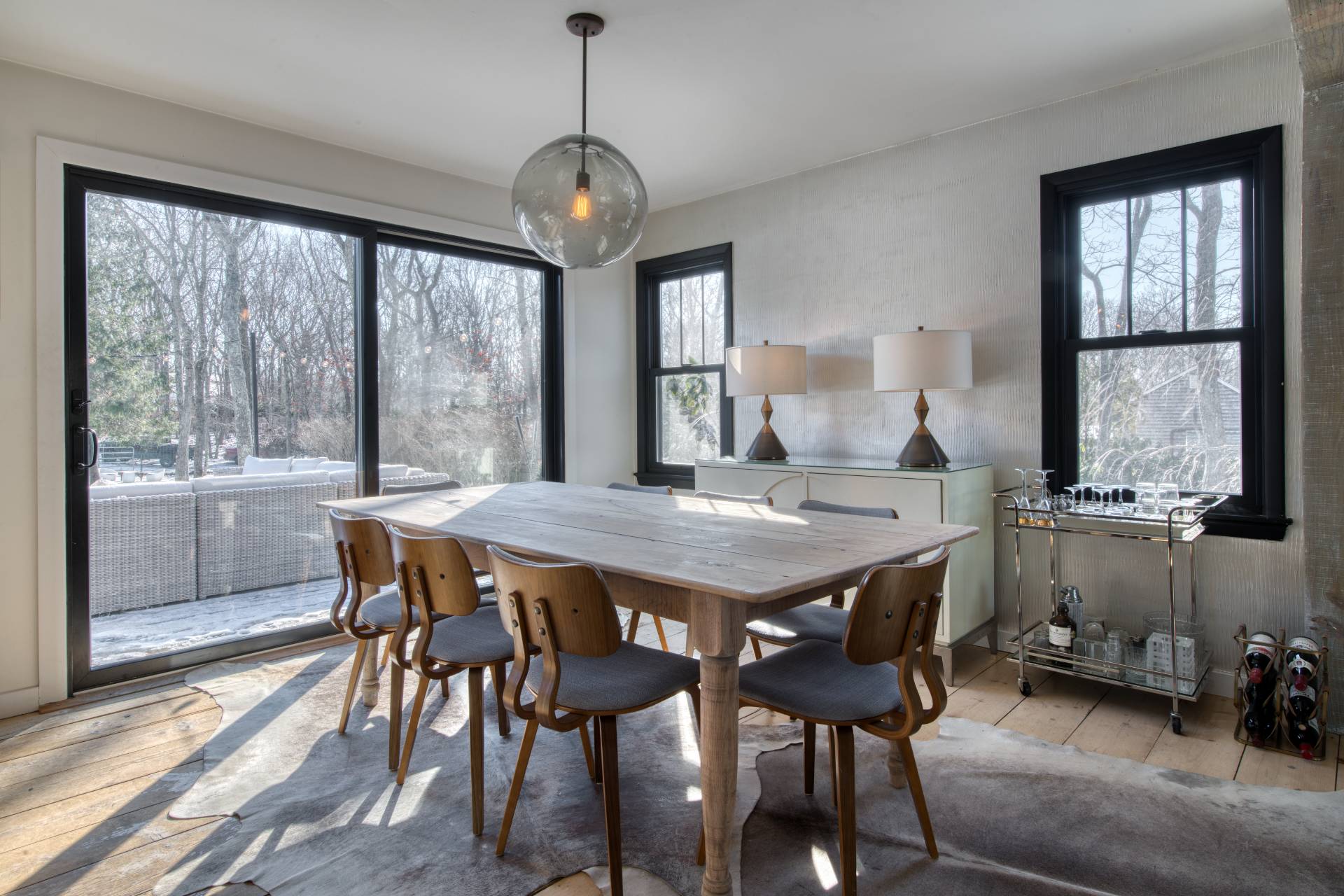 Undisclosed Address Sag Harbor, NY 11963 - Photo 10 of 23 a view of a dining room with furniture window and outside view