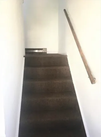 a car parked in front of a house