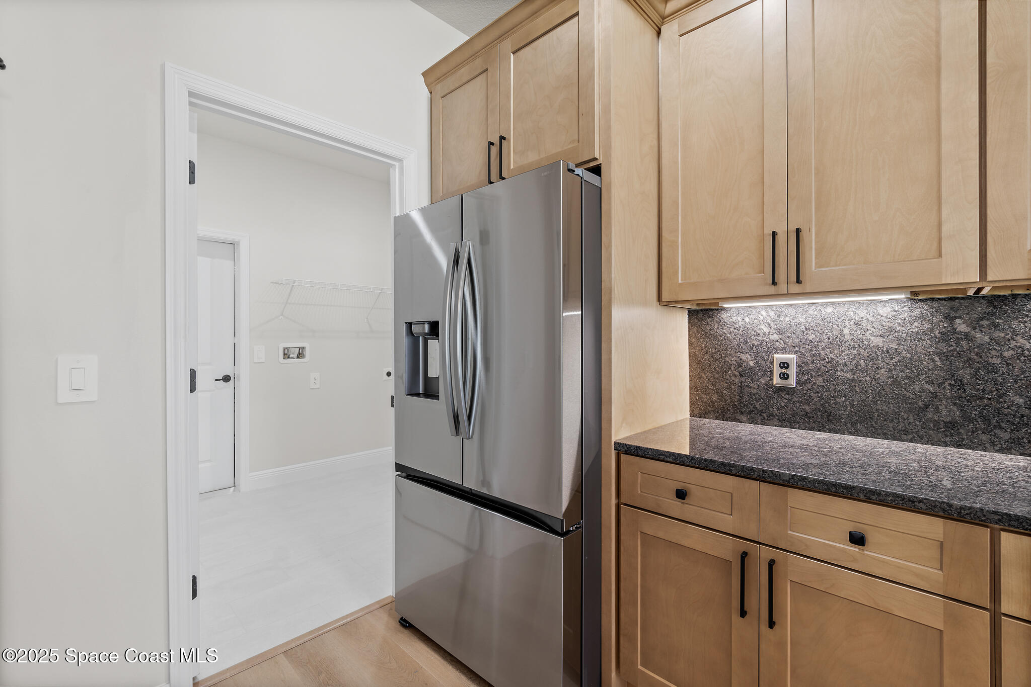 1541 Madison Road Northwest Palm Bay, FL 32907 - Photo 15 of 62 a view of a kitchen with refrigerator and cabinet