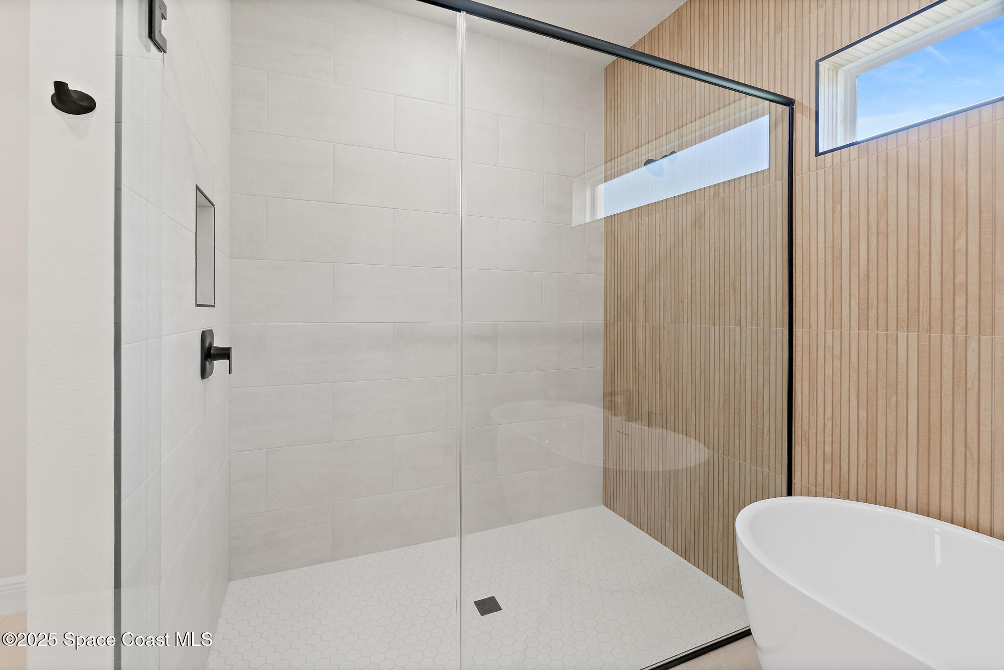 1541 Madison Road Northwest Palm Bay, FL 32907 - Photo 31 of 62 a bathroom with a shower and a toilet