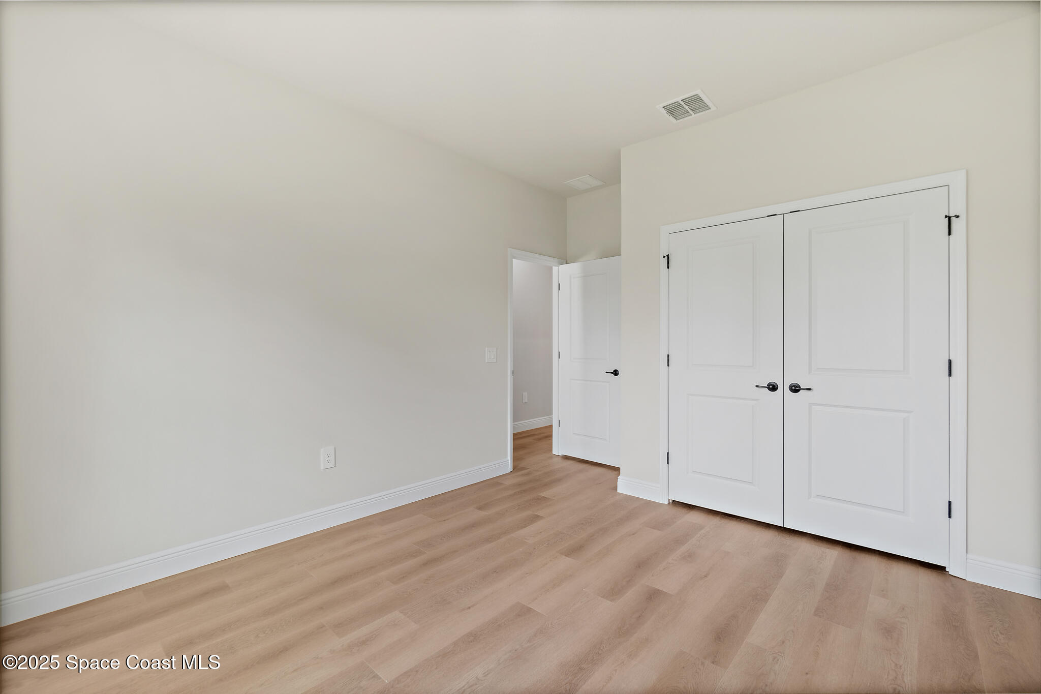 1541 Madison Road Northwest Palm Bay, FL 32907 - Photo 35 of 62 a view of an empty room