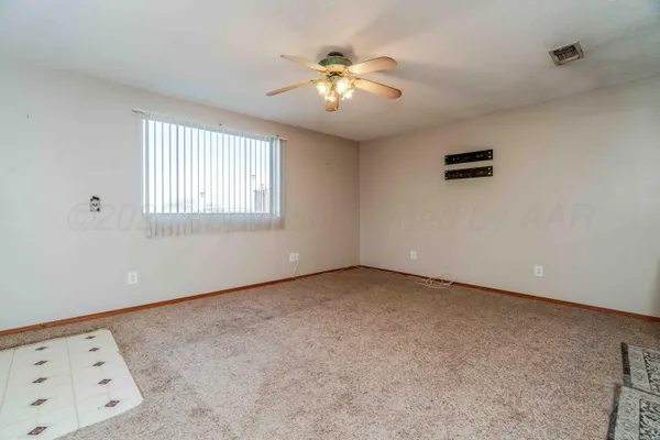 en empty room with windows