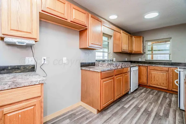 a bedroom with a bed and a cabinets