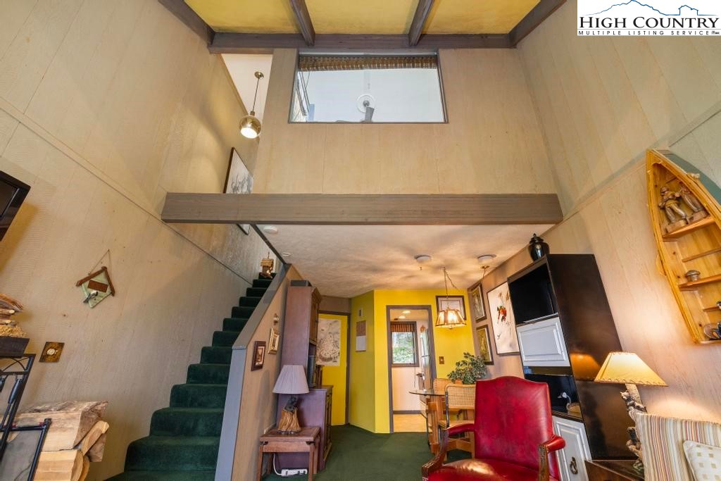 220 Northridge Road, Unit D15 Beech Mountain, NC 28604 - Photo 17 of 47 a view of entryway and hall with wooden floor