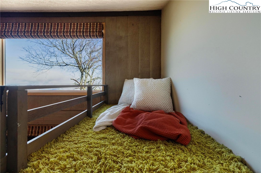 220 Northridge Road, Unit D15 Beech Mountain, NC 28604 - Photo 26 of 47 a view of bedroom with furniture