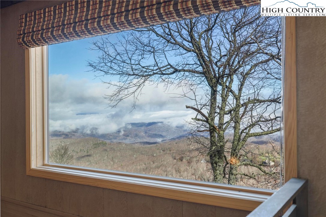 220 Northridge Road, Unit D15 Beech Mountain, NC 28604 - Photo 27 of 47 a view of a tree in a window
