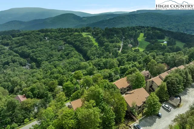 a view of balcony with wooden floor