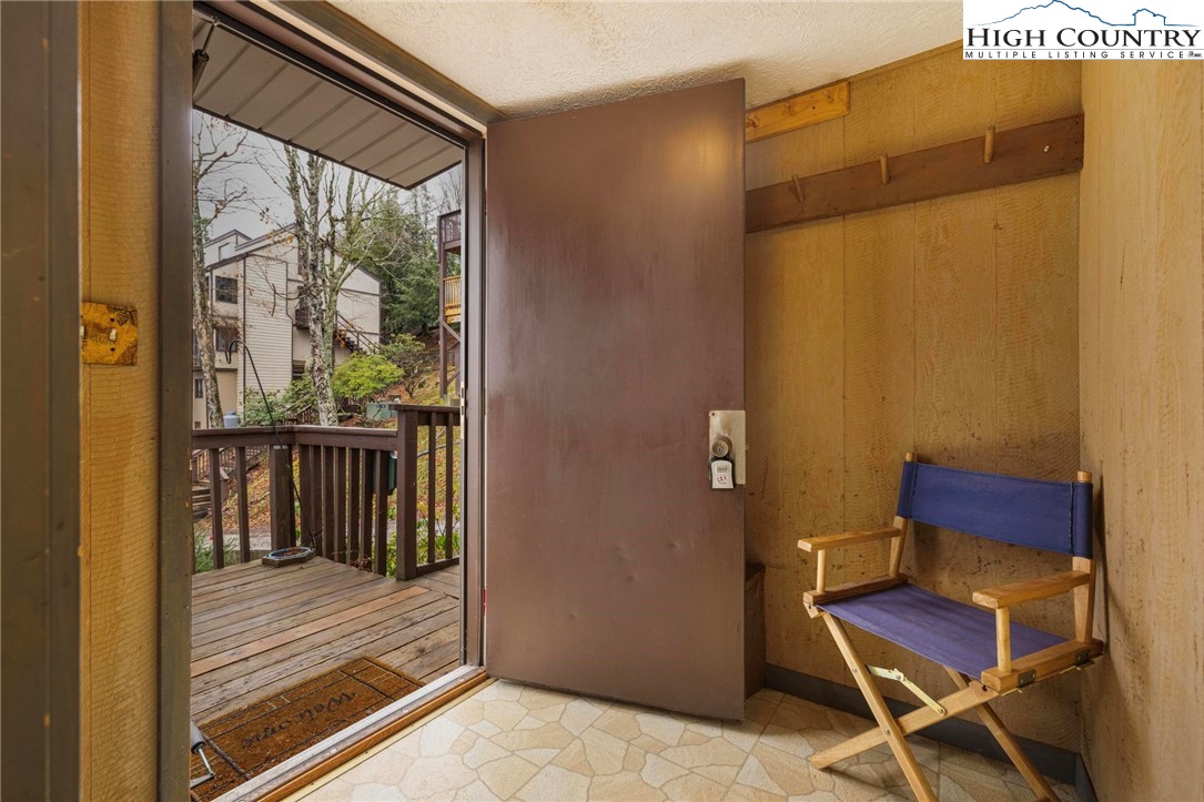 220 Northridge Road, Unit D15 Beech Mountain, NC 28604 - Photo 8 of 47 a bench sitting in front of a door