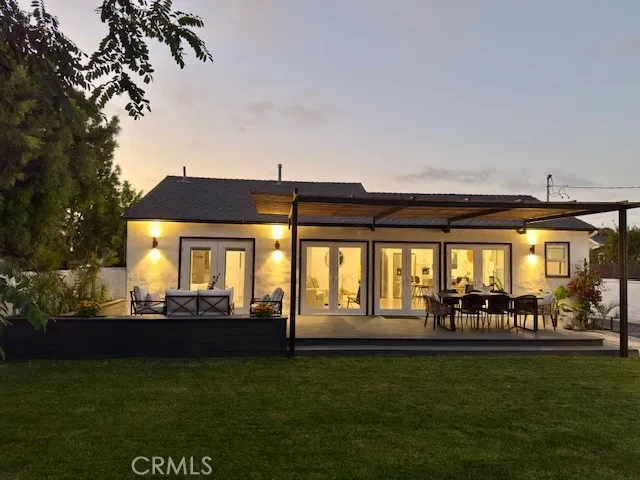 an aerial view of a house with a garden