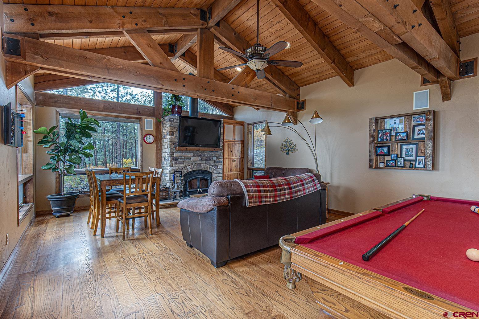 375 Nusbaum Road Durango, CO 81301 - Photo 12 of 33 a living room with furniture and a fireplace