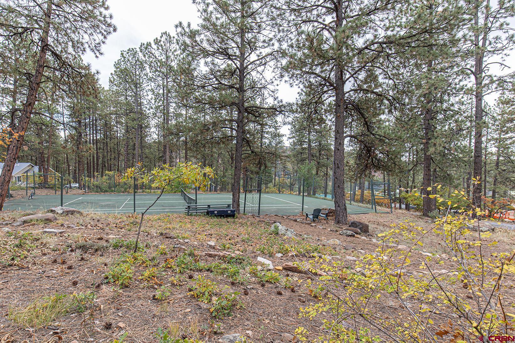 375 Nusbaum Road Durango, CO 81301 - Photo 28 of 33 a backyard of a house with lots of green space