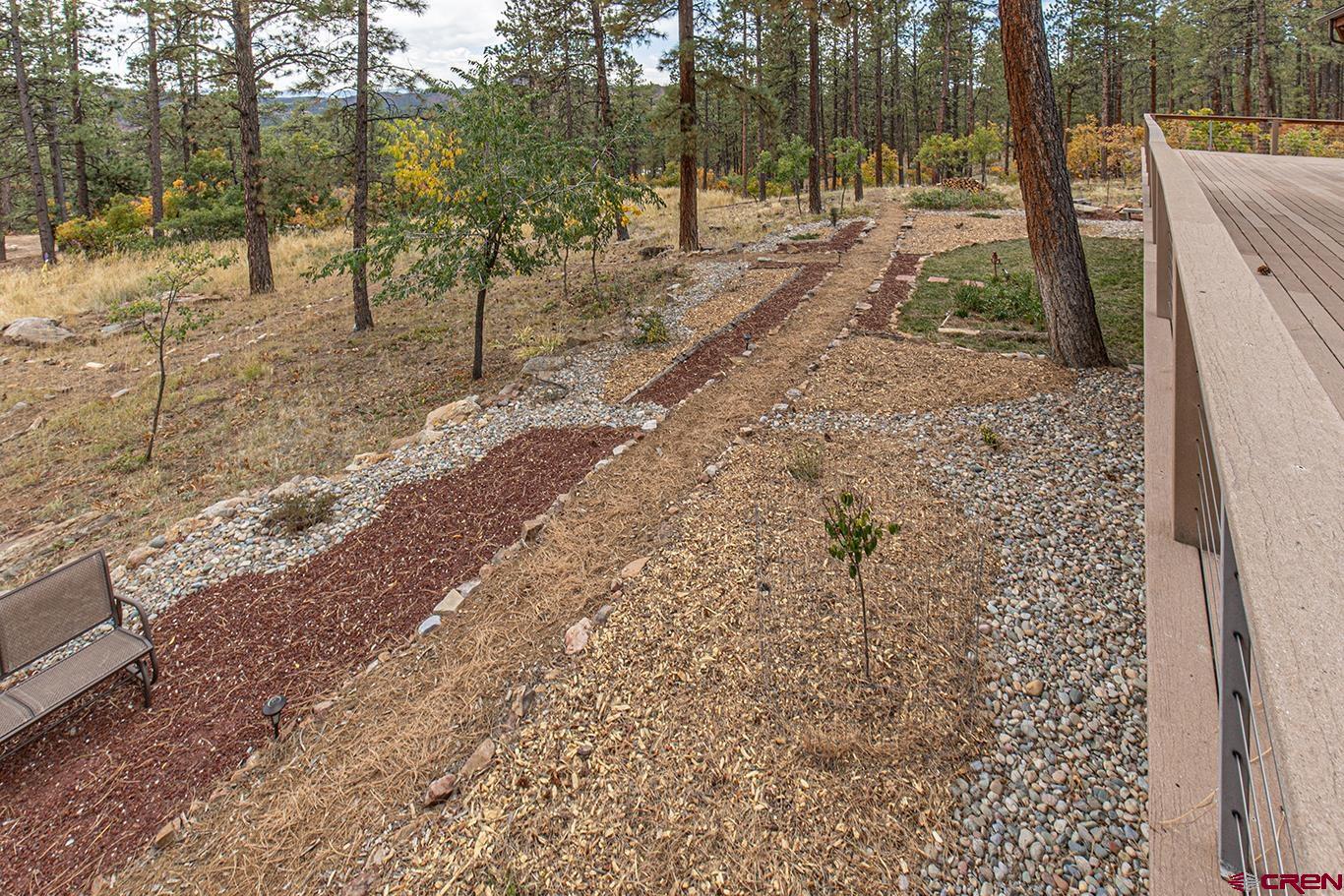 375 Nusbaum Road Durango, CO 81301 - Photo 32 of 33 a view of a yard with a tree