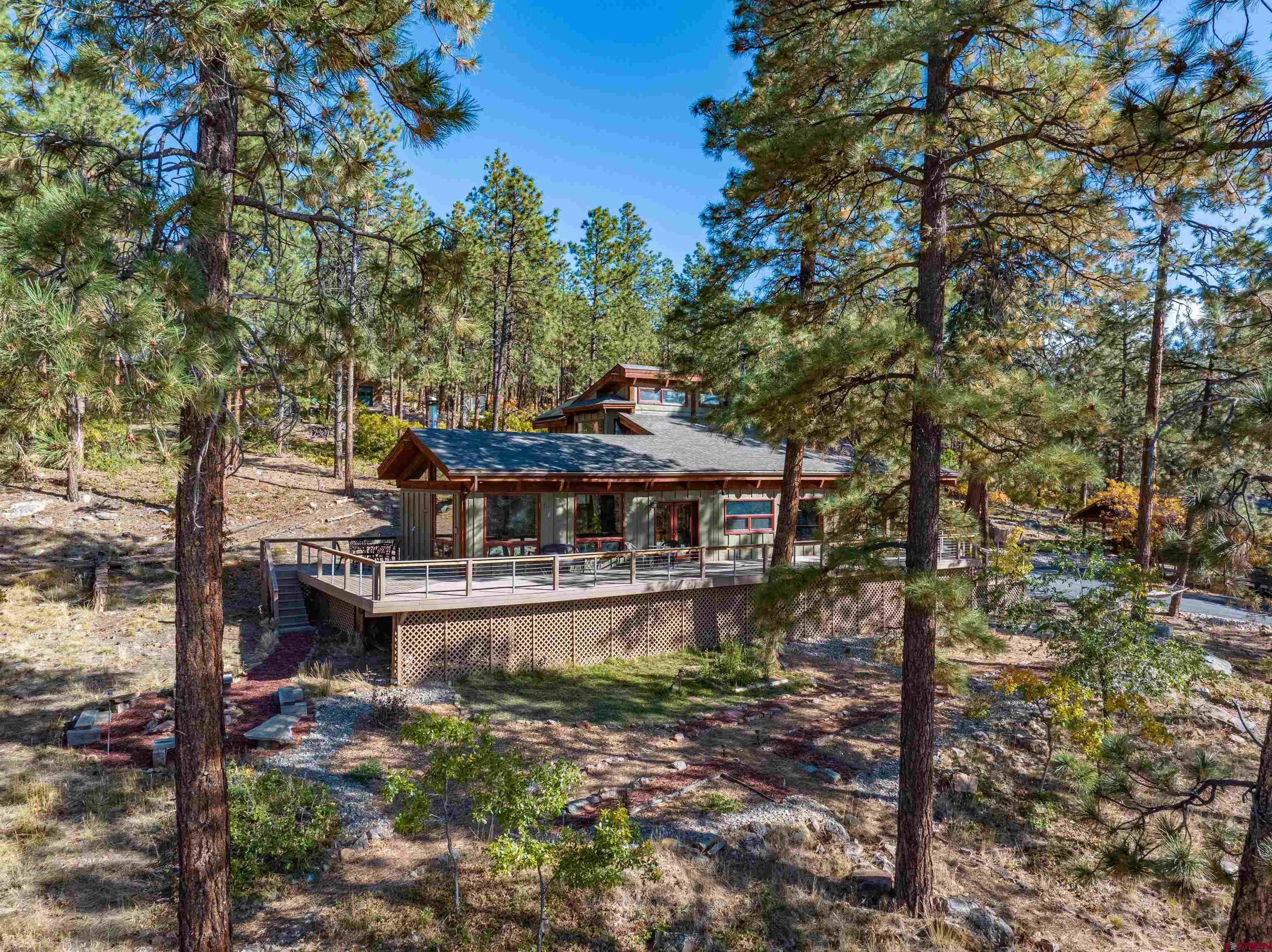375 Nusbaum Road Durango, CO 81301 - Photo 4 of 33 a view of a house with a yard