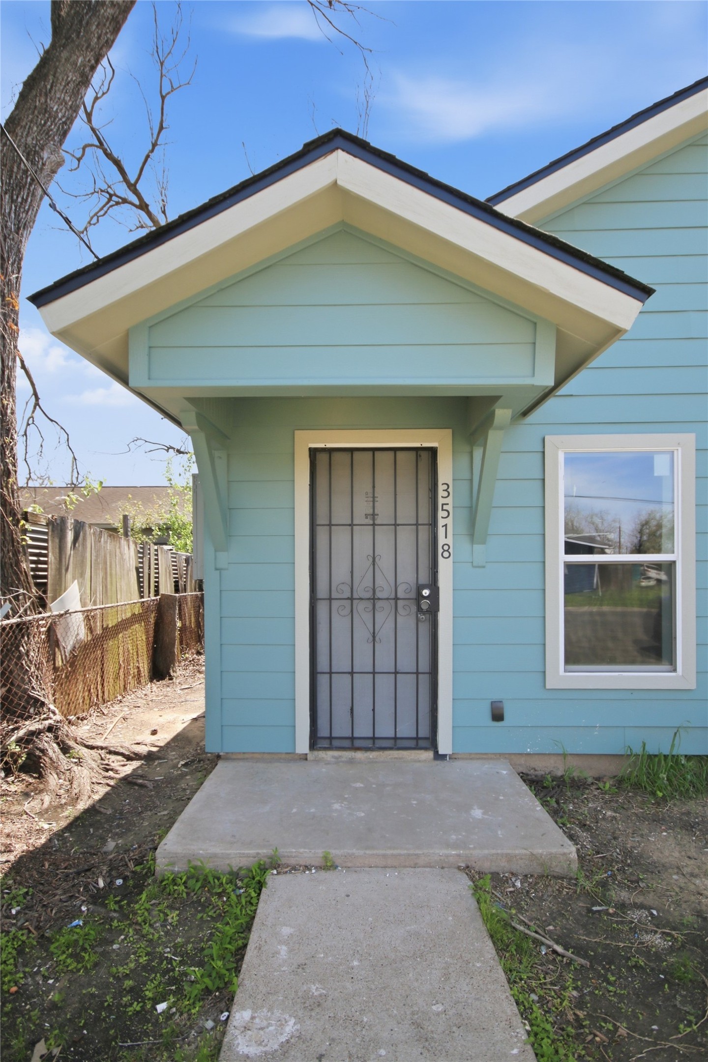 3518 Orange Street Houston, TX 77020 - Photo 1 of 27 a front view of a house with a yard