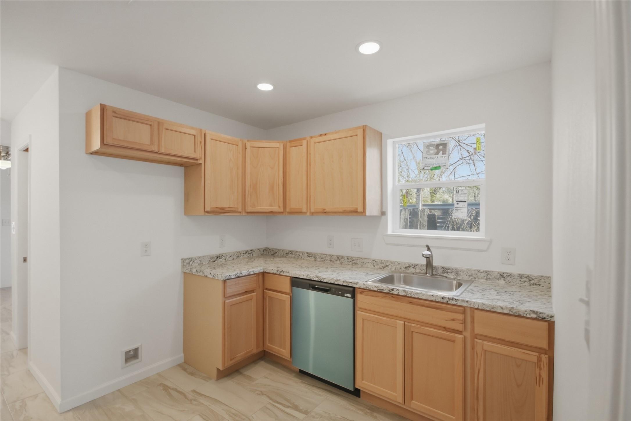 3518 Orange Street Houston, TX 77020 - Photo 17 of 27 a kitchen with sink and cabinets