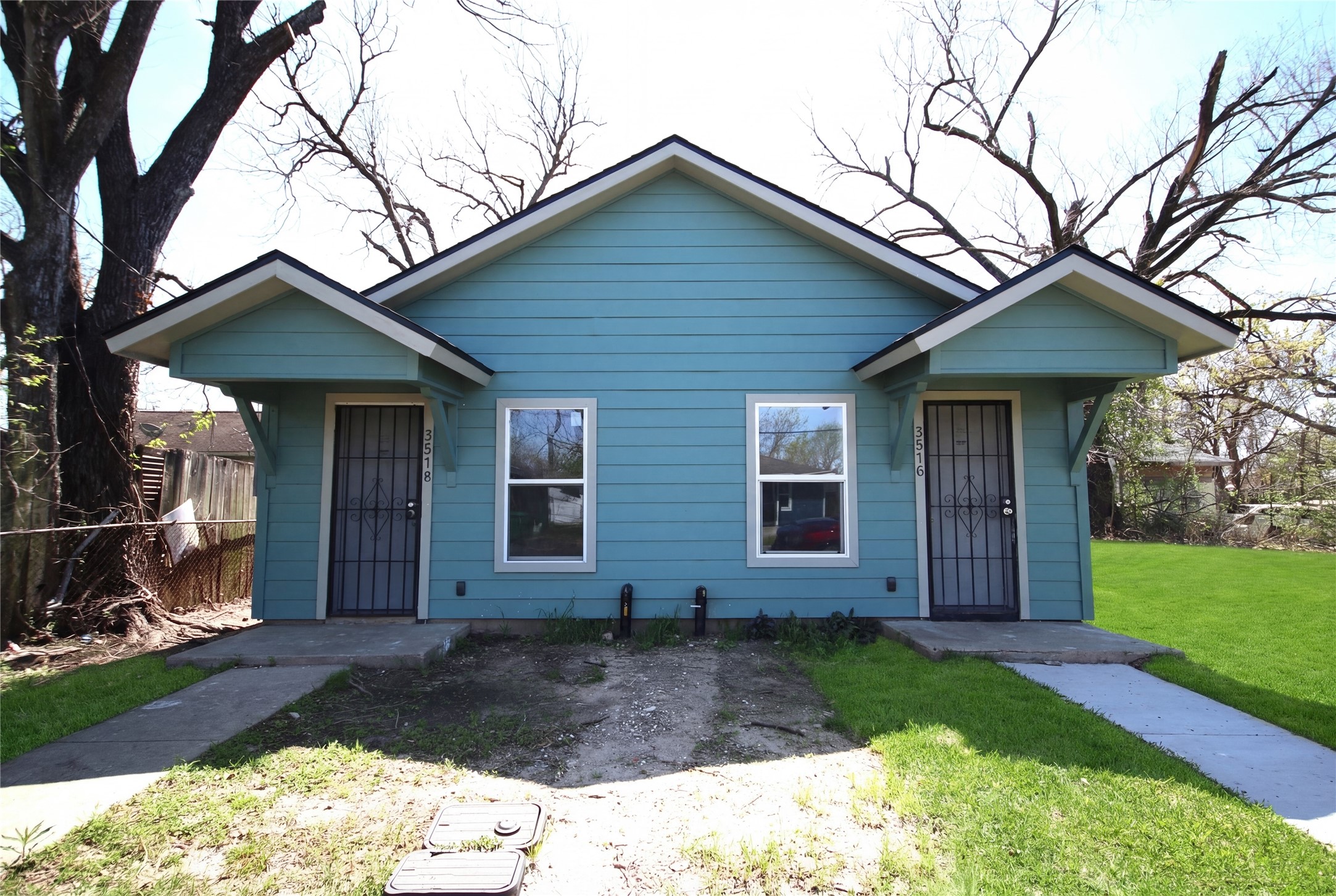 3518 Orange Street Houston, TX 77020 - Photo 2 of 27 a front view of a house with garden