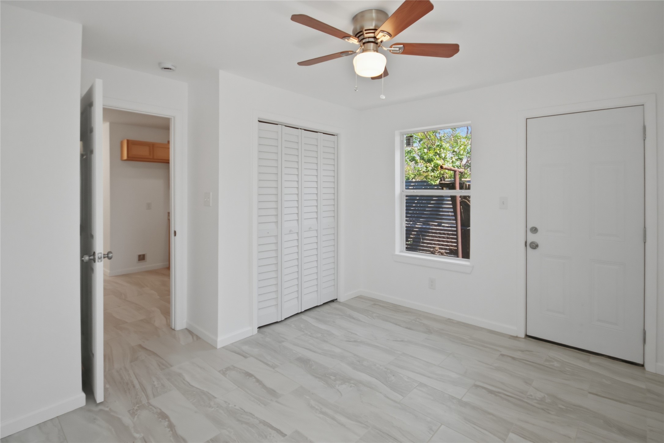 3518 Orange Street Houston, TX 77020 - Photo 22 of 27 a view of an empty room with a window