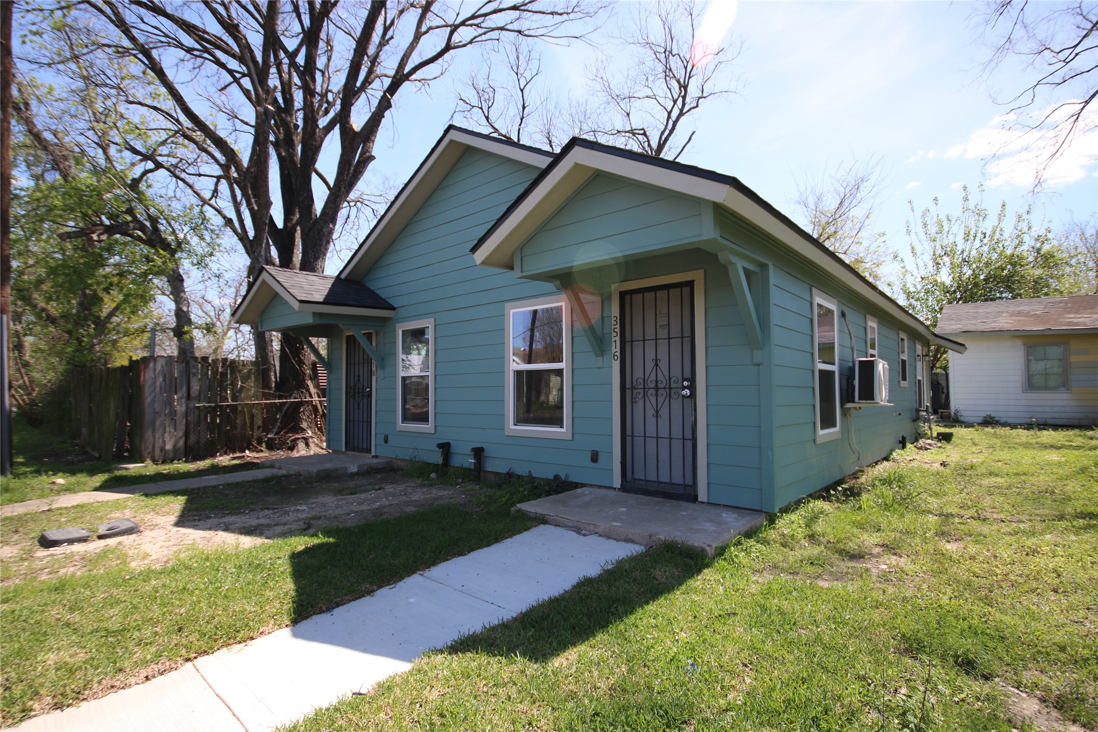 3518 Orange Street Houston, TX 77020 - Photo 27 of 27 a front view of a house with a yard