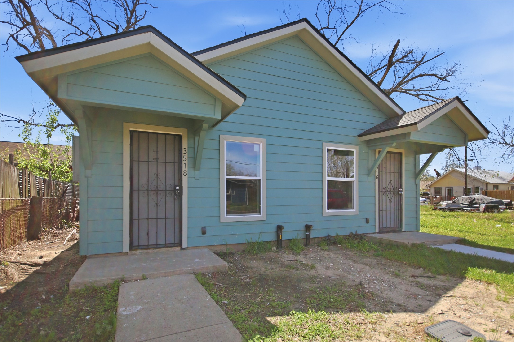 3518 Orange Street Houston, TX 77020 - Photo 3 of 27 a front view of a house with garden
