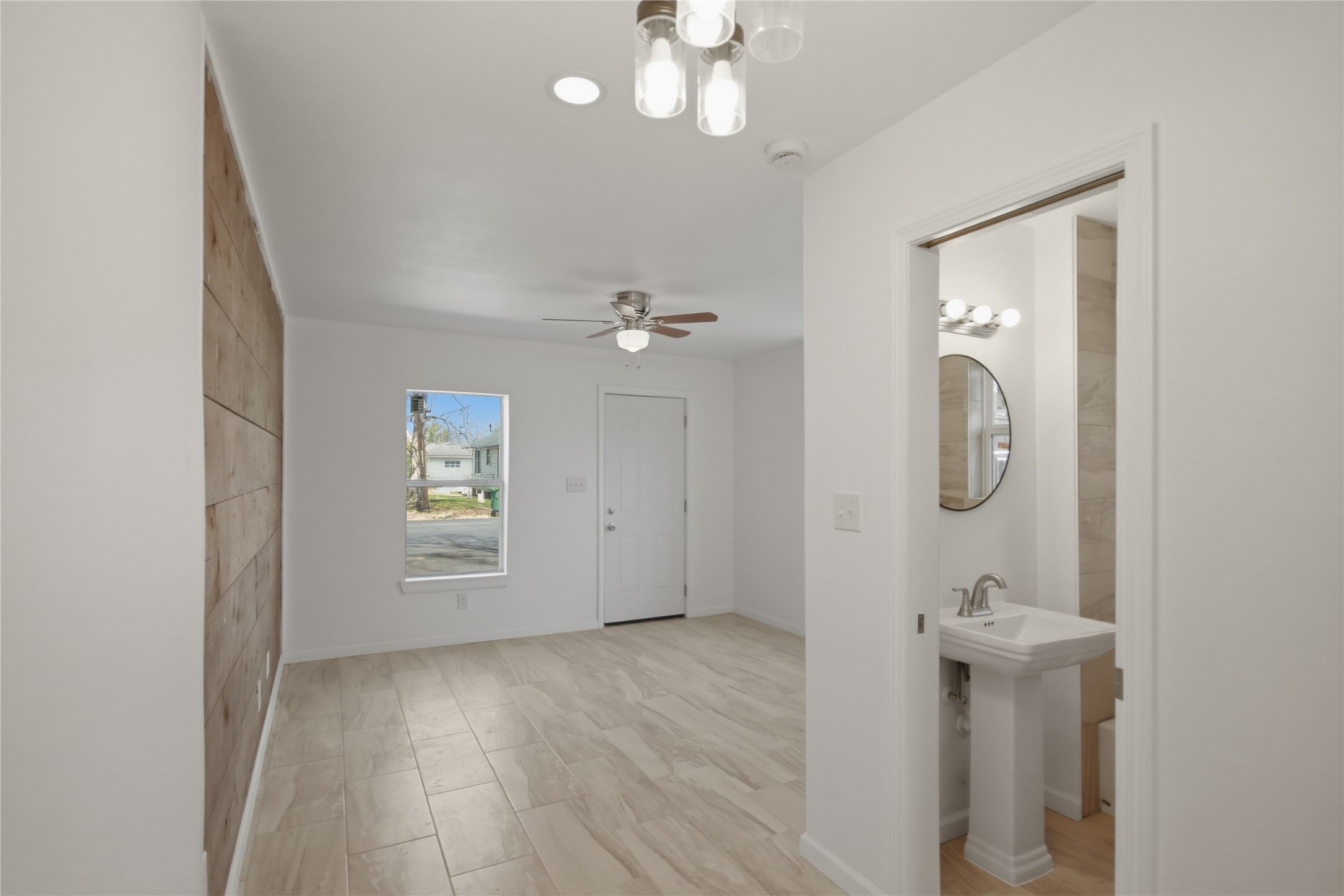 3518 Orange Street Houston, TX 77020 - Photo 6 of 27 wooden floor in an empty room