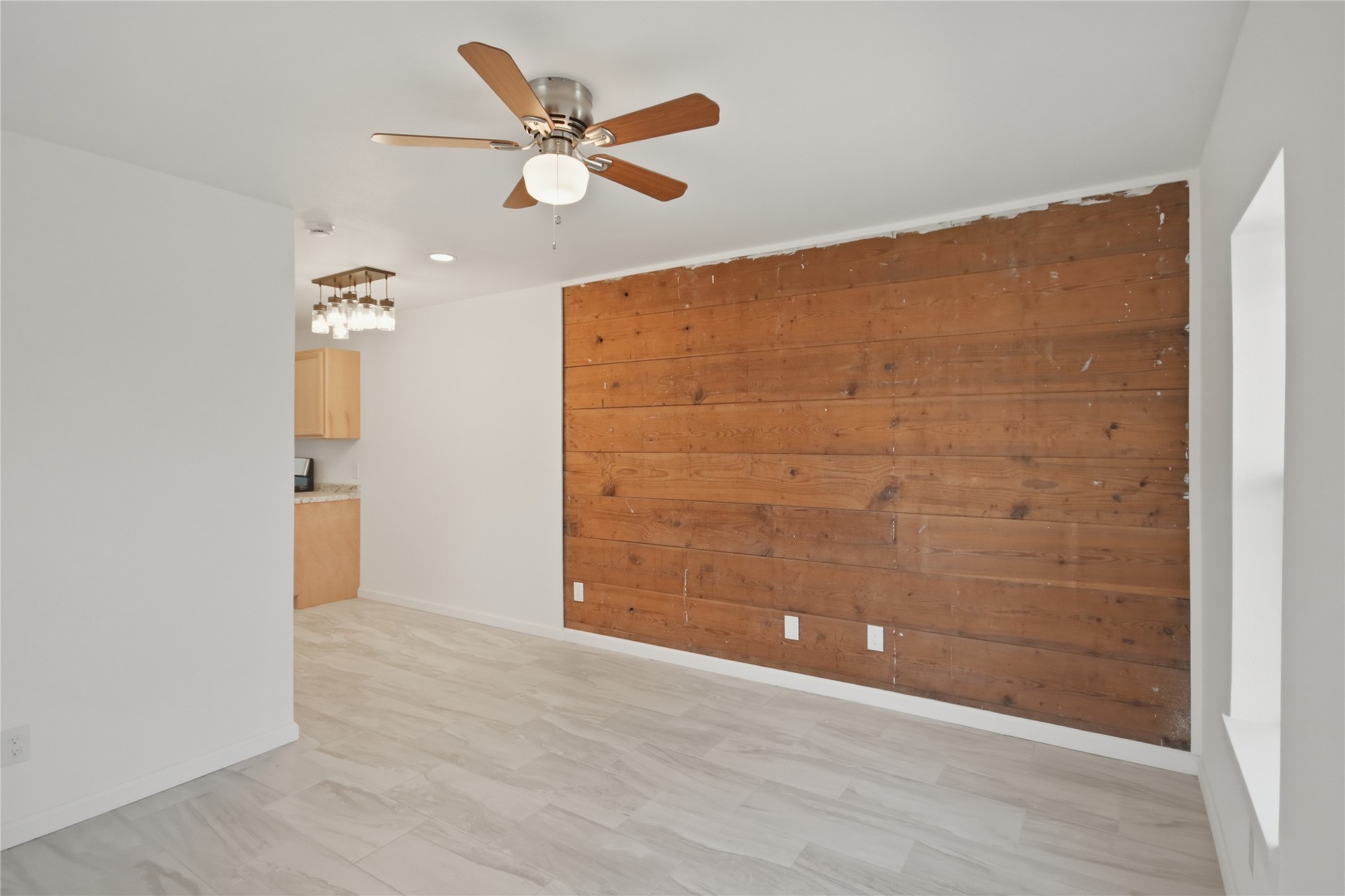 3518 Orange Street Houston, TX 77020 - Photo 7 of 27 wooden floor in an empty room