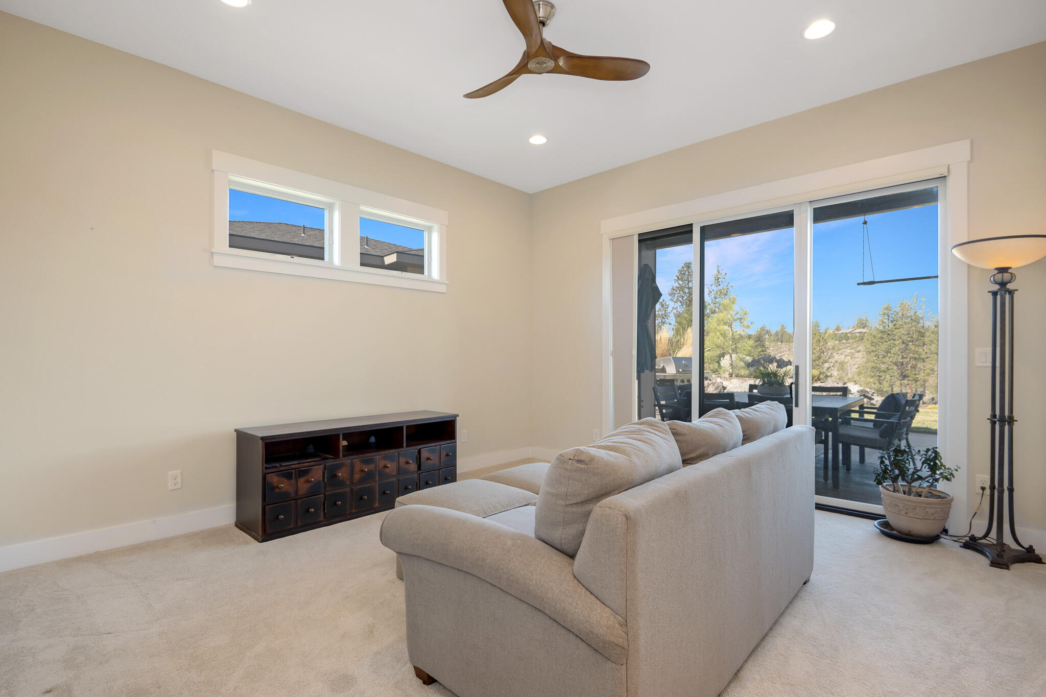 60871 River Rim Drive Bend, OR 97702 - Photo 36 of 42 a living room with furniture