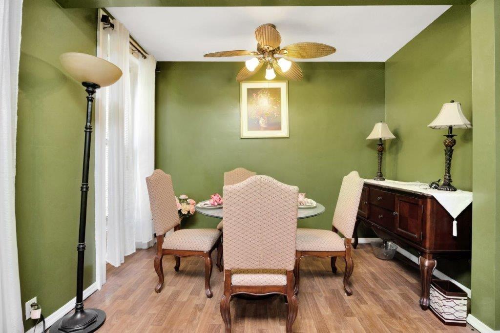 964 Gates Avenue Brooklyn, NY 11221 - Photo 16 of 25 a workspace room with furniture and wooden floor