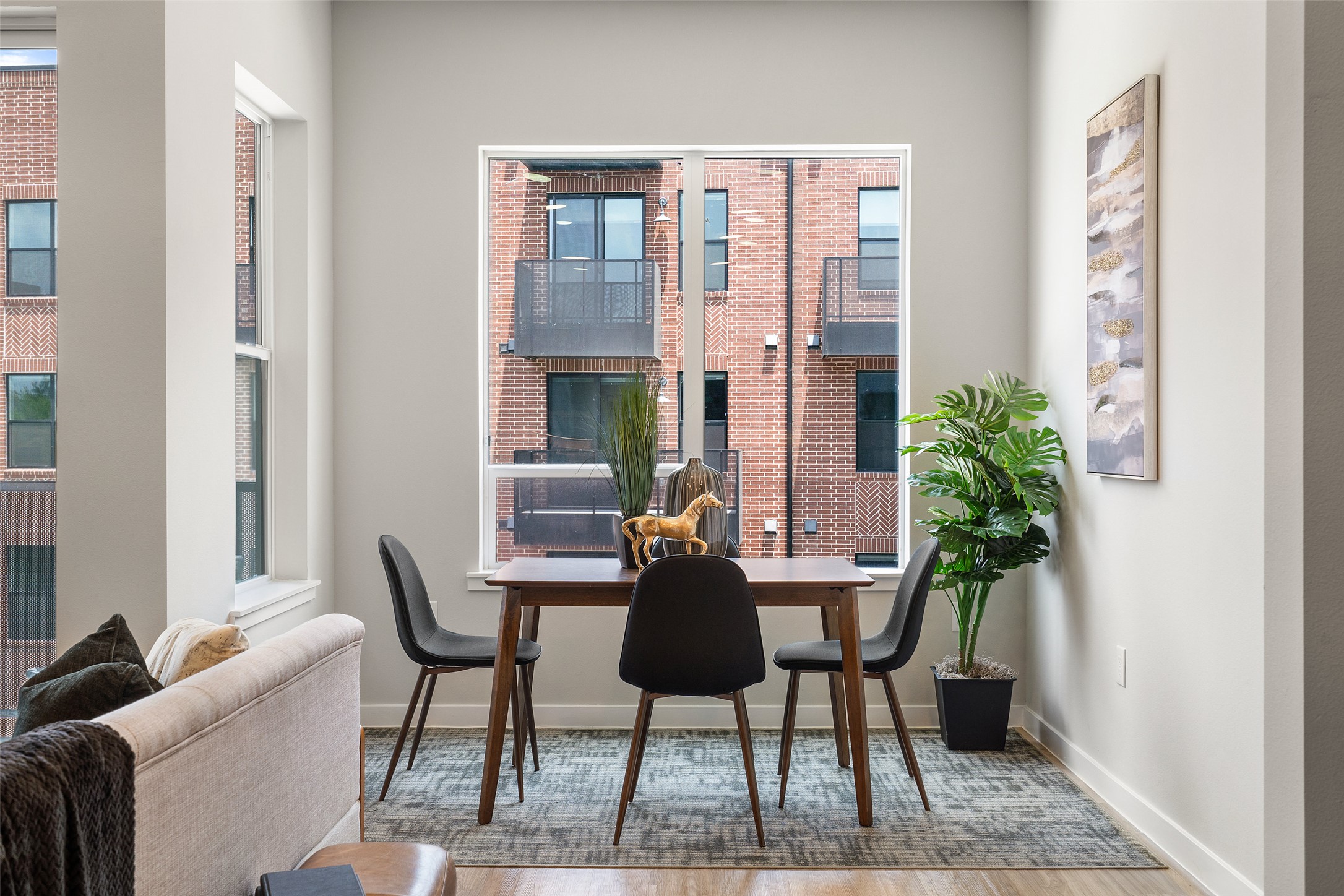 4510 Terry-O Lane, Unit 341 Austin, TX 78745 - Photo 21 of 40 This dining area features a large window, providing natural light, and offers views of the surrounding brick architecture
