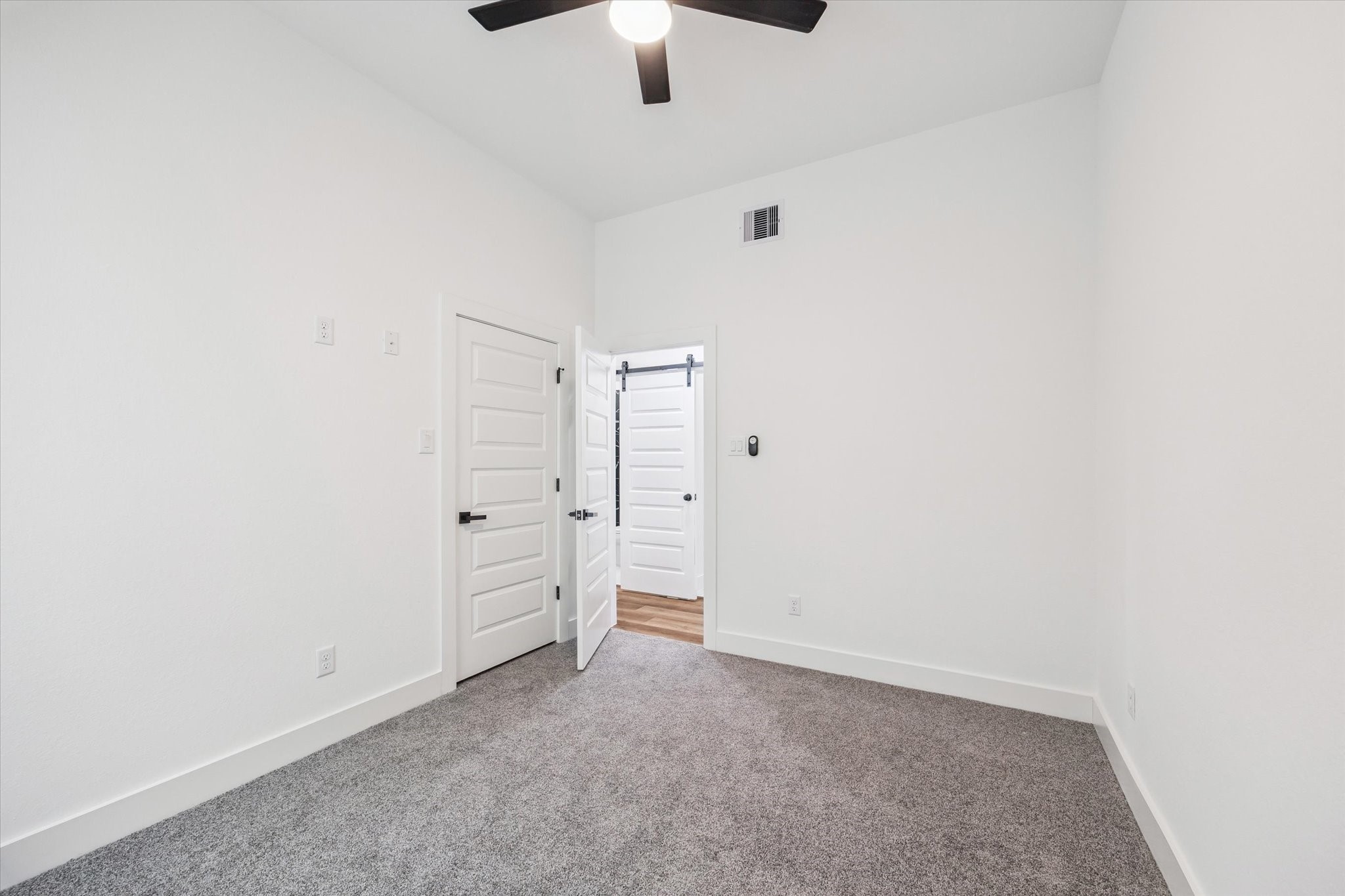 9806 A/B Pelsey Street, Unit A Houston, TX 77029 - Photo 7 of 10 an empty room with closet and windows