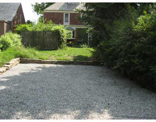 535 Westover Road Mt. Lebanon, PA 15228 - Photo 13 of 13 Exterior Front. Parking pad (2-car width), back of house and yard