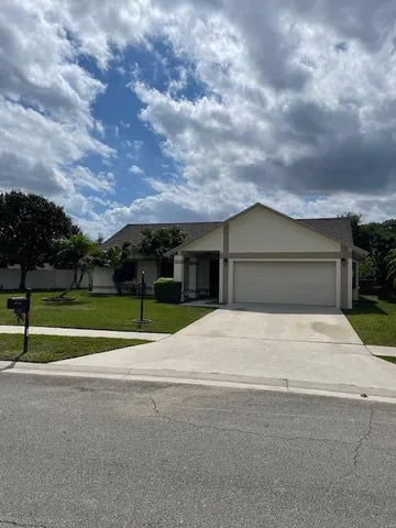 a house view with a garden space