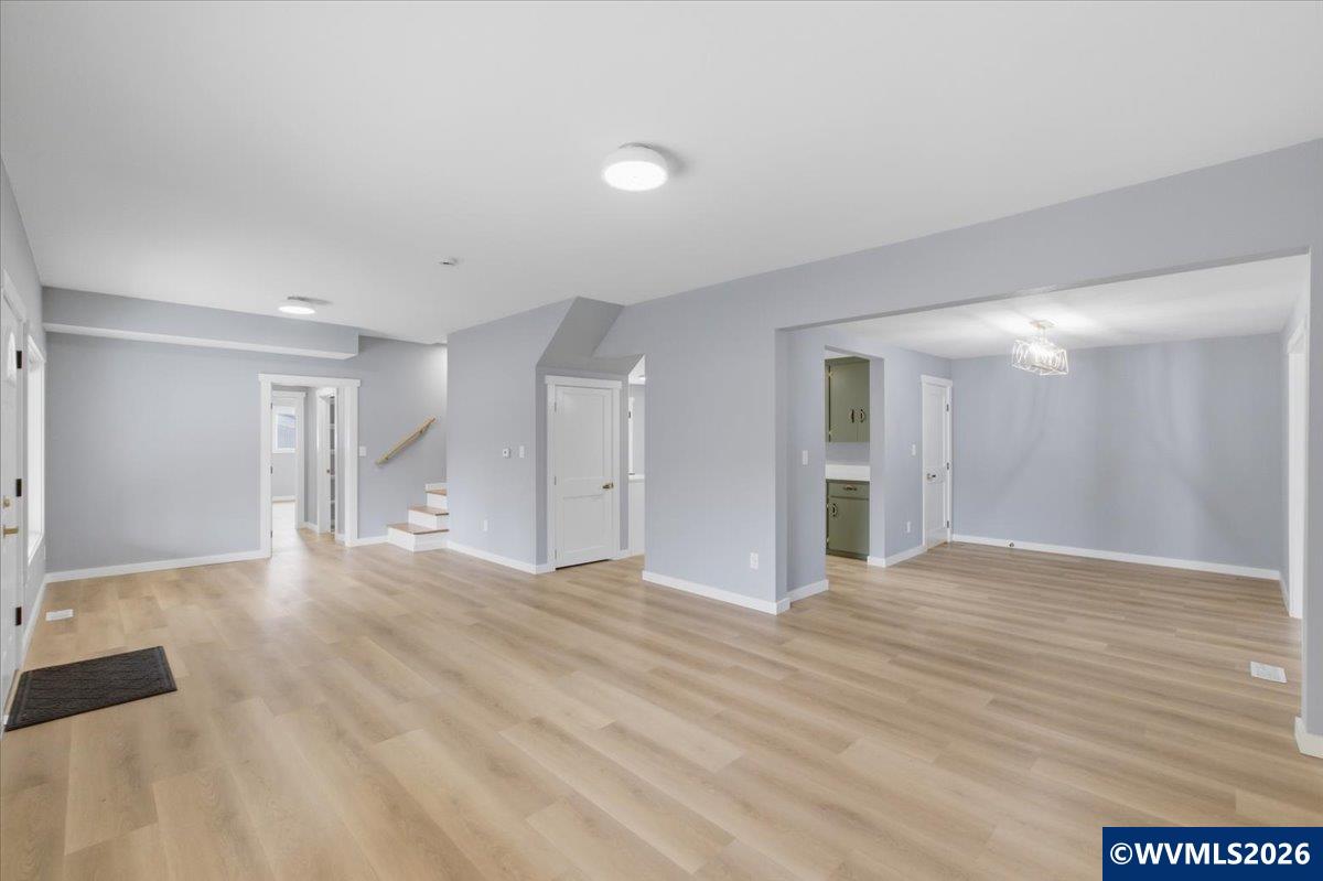 28411 Liberty Road Sweet Home, OR 97386 - Photo 29 of 50 a view of an empty room with wooden floor