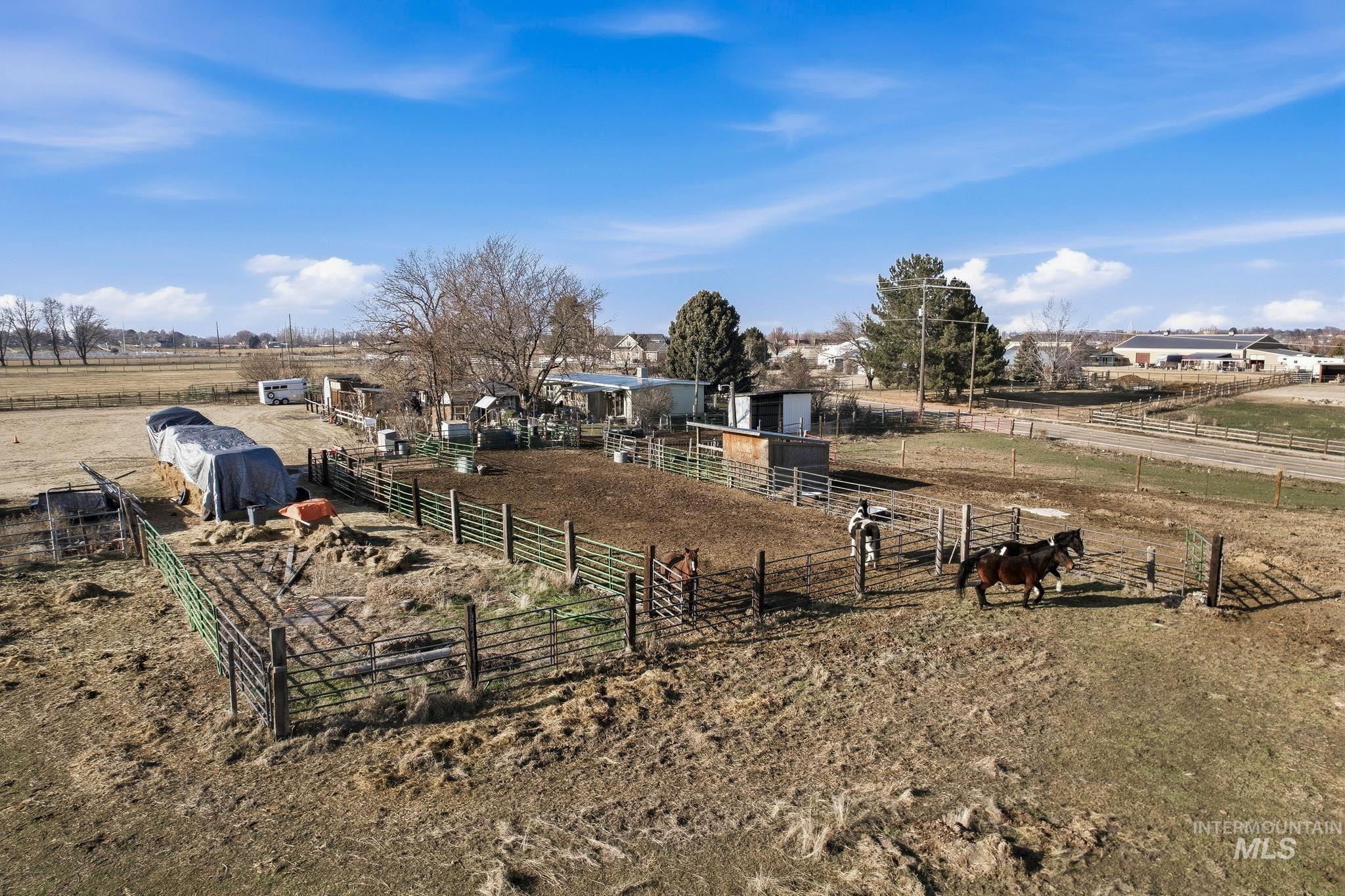 603 East King Road Kuna, ID 83634 - Photo 10 of 24 View of yard featuring a view of rural / pastoral area and an outbuilding