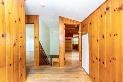 2513 21st Street, Unit FRONT Lubbock, TX 79410 - Photo 15 of 19 a view of a hallway with wooden floor and entryway