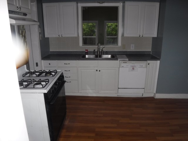 2148 Downey Road Homewood, IL 60430 - Photo 4 of 15 a kitchen with a sink stove and cabinets