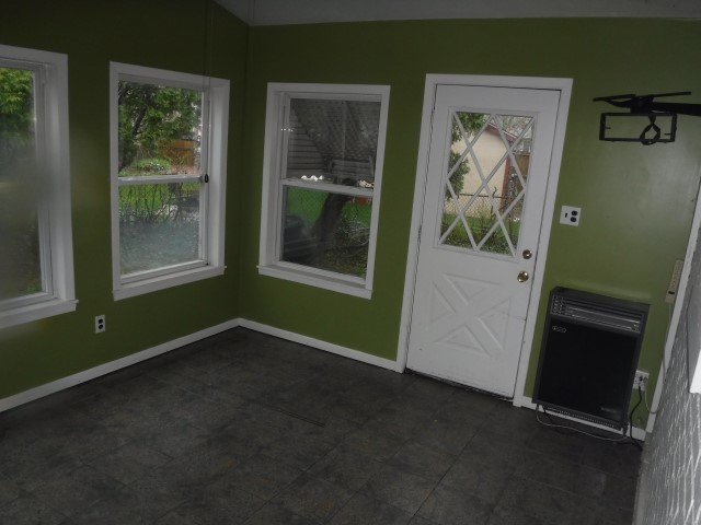 2148 Downey Road Homewood, IL 60430 - Photo 6 of 15 an empty room with window and doors
