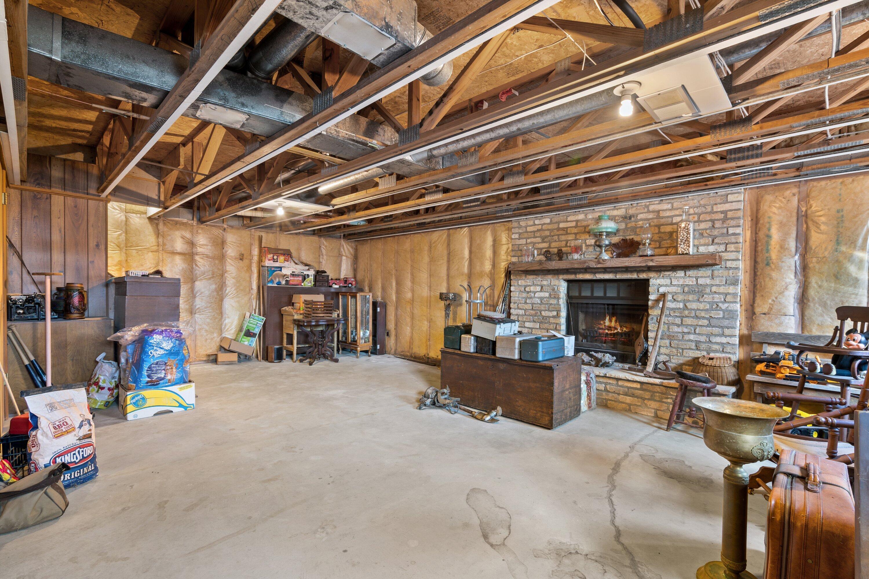 9545 County Highway Kewaskum, WI 53040 - Photo 18 of 34 Basement Fireplace