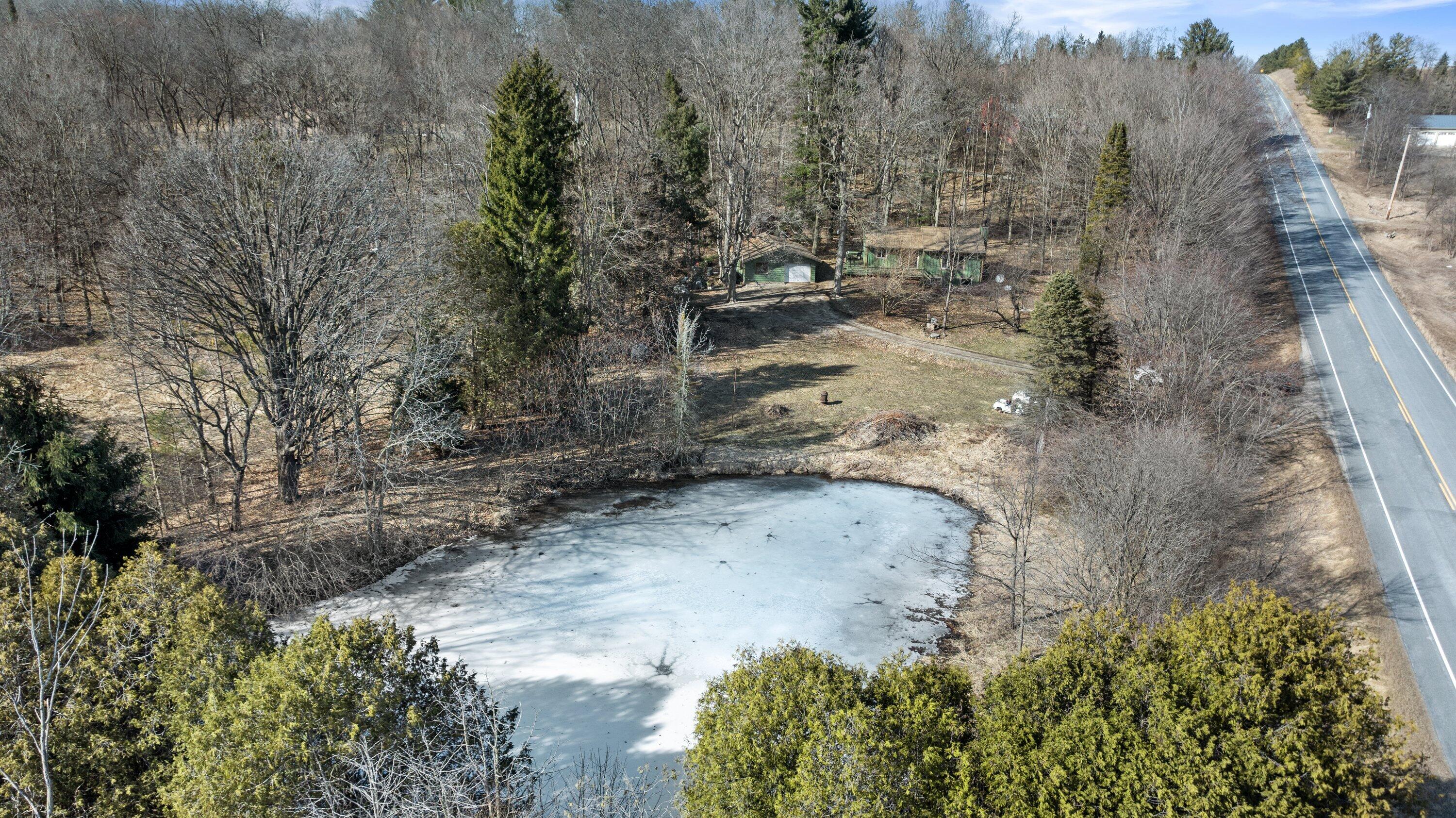 9545 County Highway Kewaskum, WI 53040 - Photo 2 of 34 9545 Cty Hwy XX pond & house