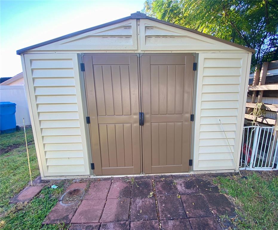 1632 Heather Place Palm Harbor, FL 34684 - Photo 30 of 39 a view of a backyard