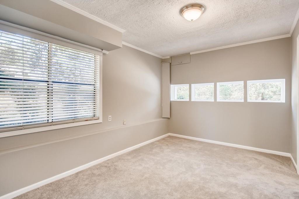 2274 Turtle Landing Marietta, GA 30066 - Photo 12 of 28 a view of an empty room with a window