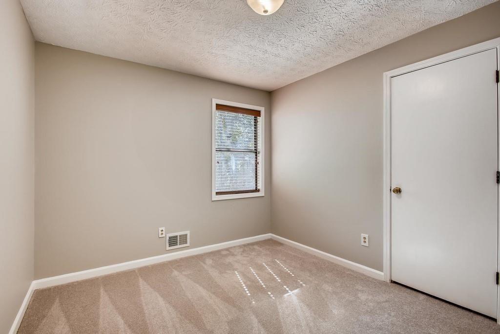 2274 Turtle Landing Marietta, GA 30066 - Photo 15 of 28 a view of an empty room with a window