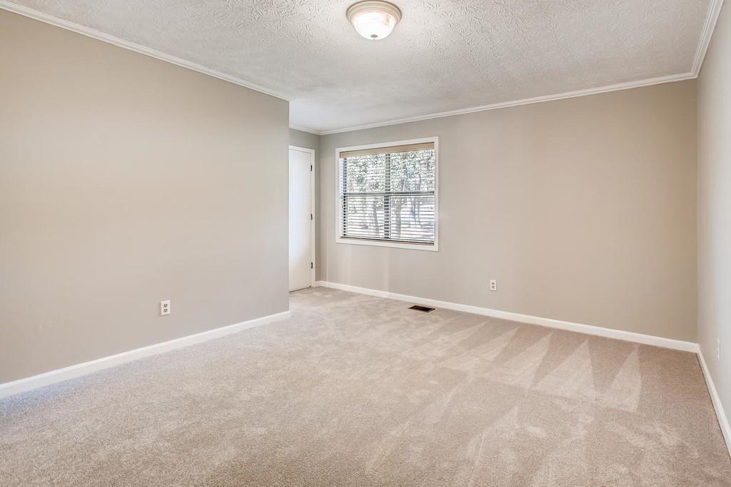2274 Turtle Landing Marietta, GA 30066 - Photo 20 of 28 an empty room with windows and closet