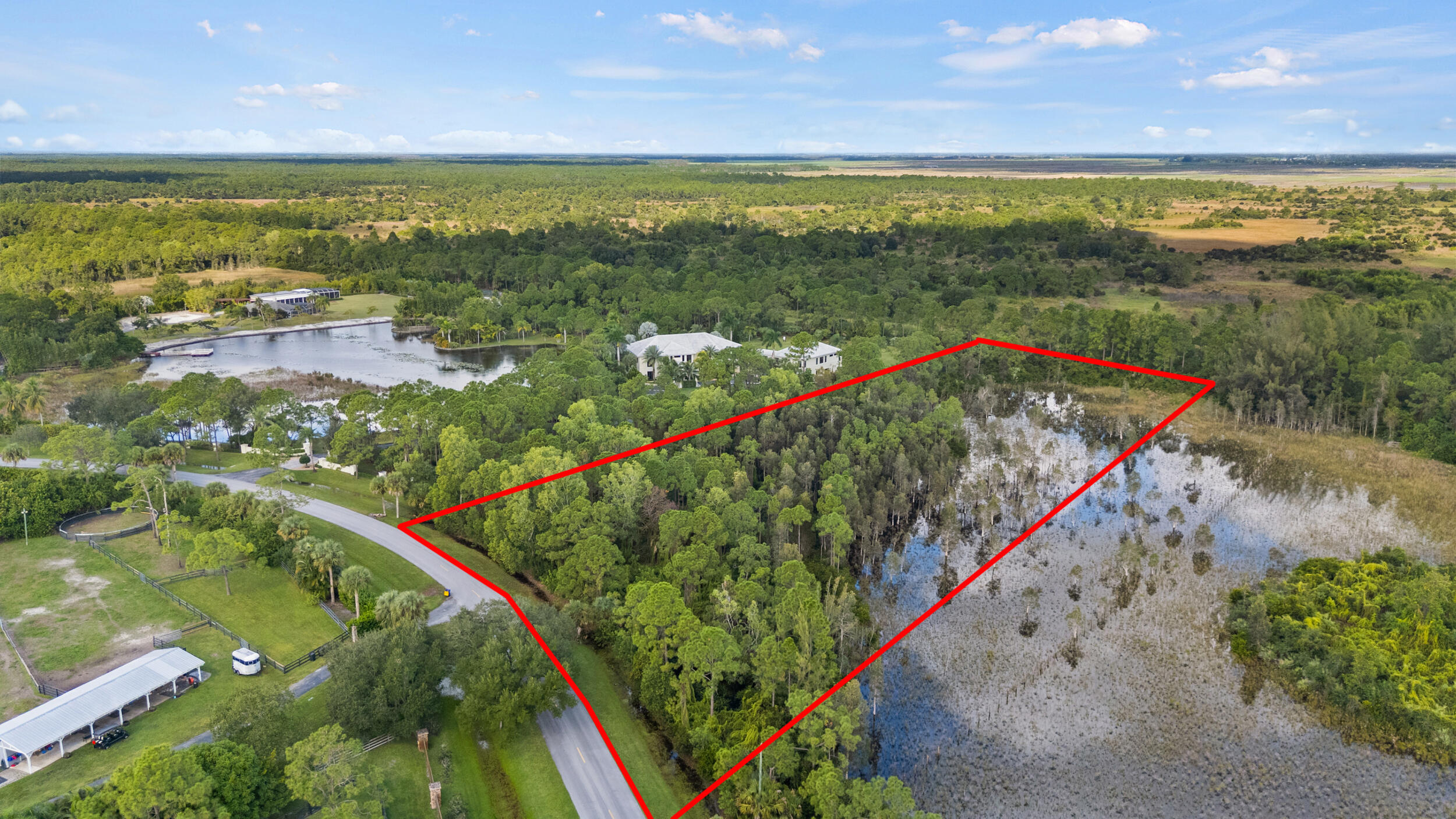 2524 Southeast Ranch Acres Circle Jupiter, FL 33478 - Photo 3 of 5 DJI_20251104231612_0397_D