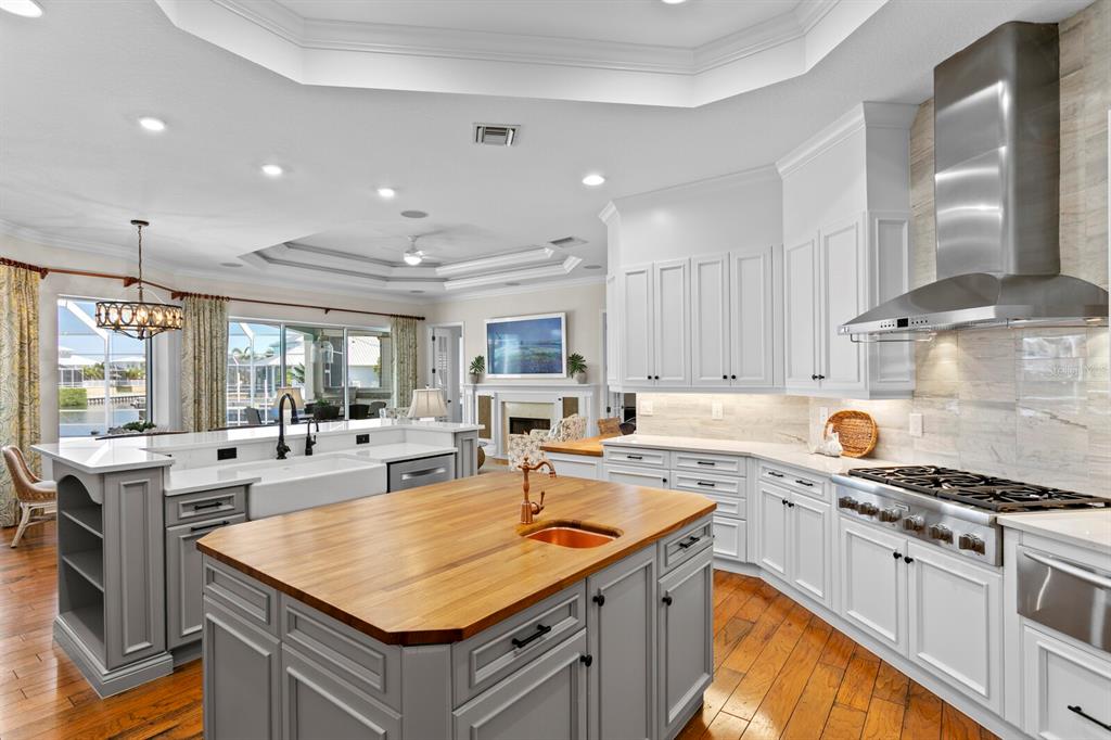 625 Balibay Road Apollo Beach, FL 33572 - Photo 13 of 51 a kitchen with a stove sink and cabinets