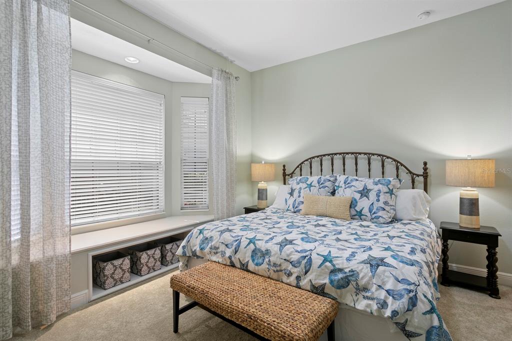 625 Balibay Road Apollo Beach, FL 33572 - Photo 29 of 51 a bedroom with a bed and a window