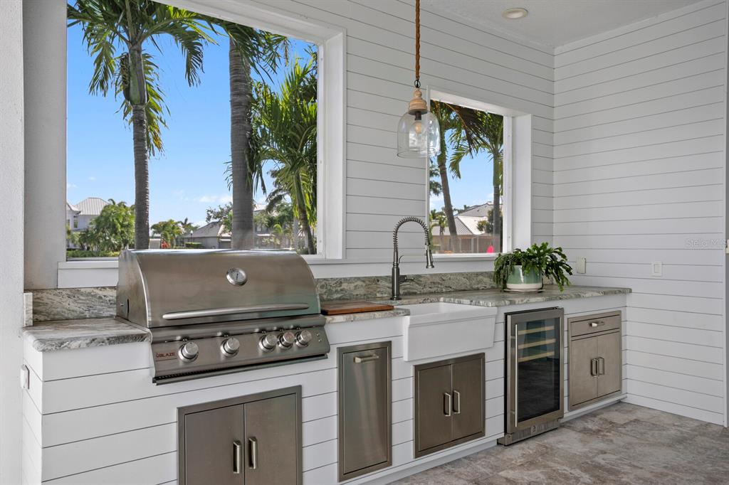 625 Balibay Road Apollo Beach, FL 33572 - Photo 40 of 51 a stove top oven sitting inside of a kitchen