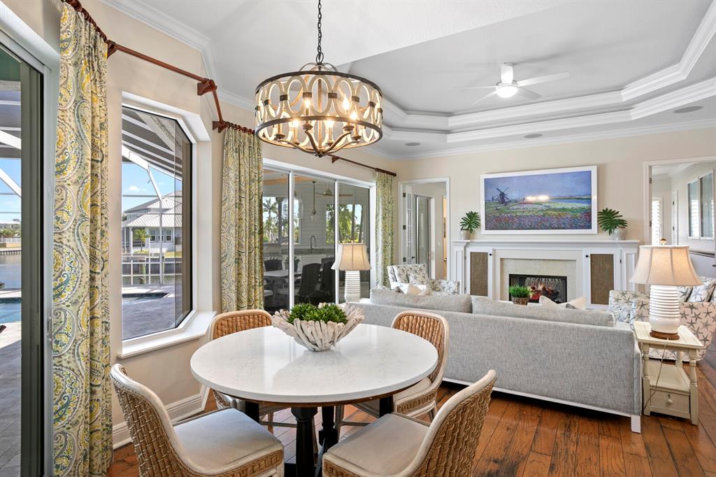 625 Balibay Road Apollo Beach, FL 33572 - Photo 4 of 51 a view of a dining room with furniture window and wooden floor