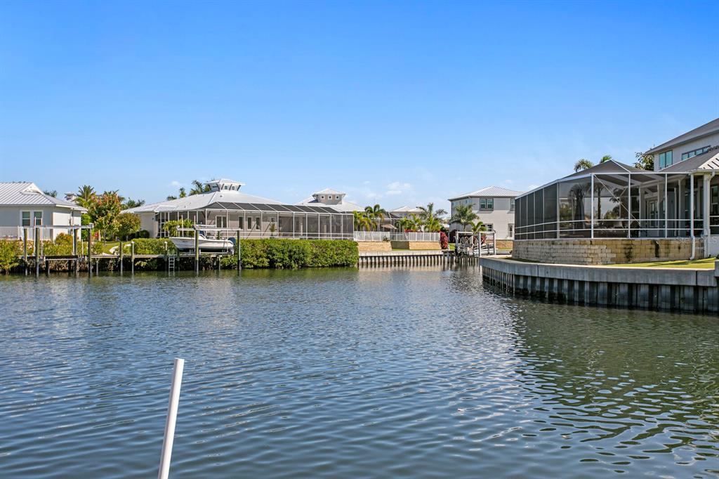 625 Balibay Road Apollo Beach, FL 33572 - Photo 45 of 51 a view of a lake with boats and trees in the background